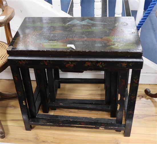 A nest of three Chinese polychrome lacquer occasional tables W.66cm